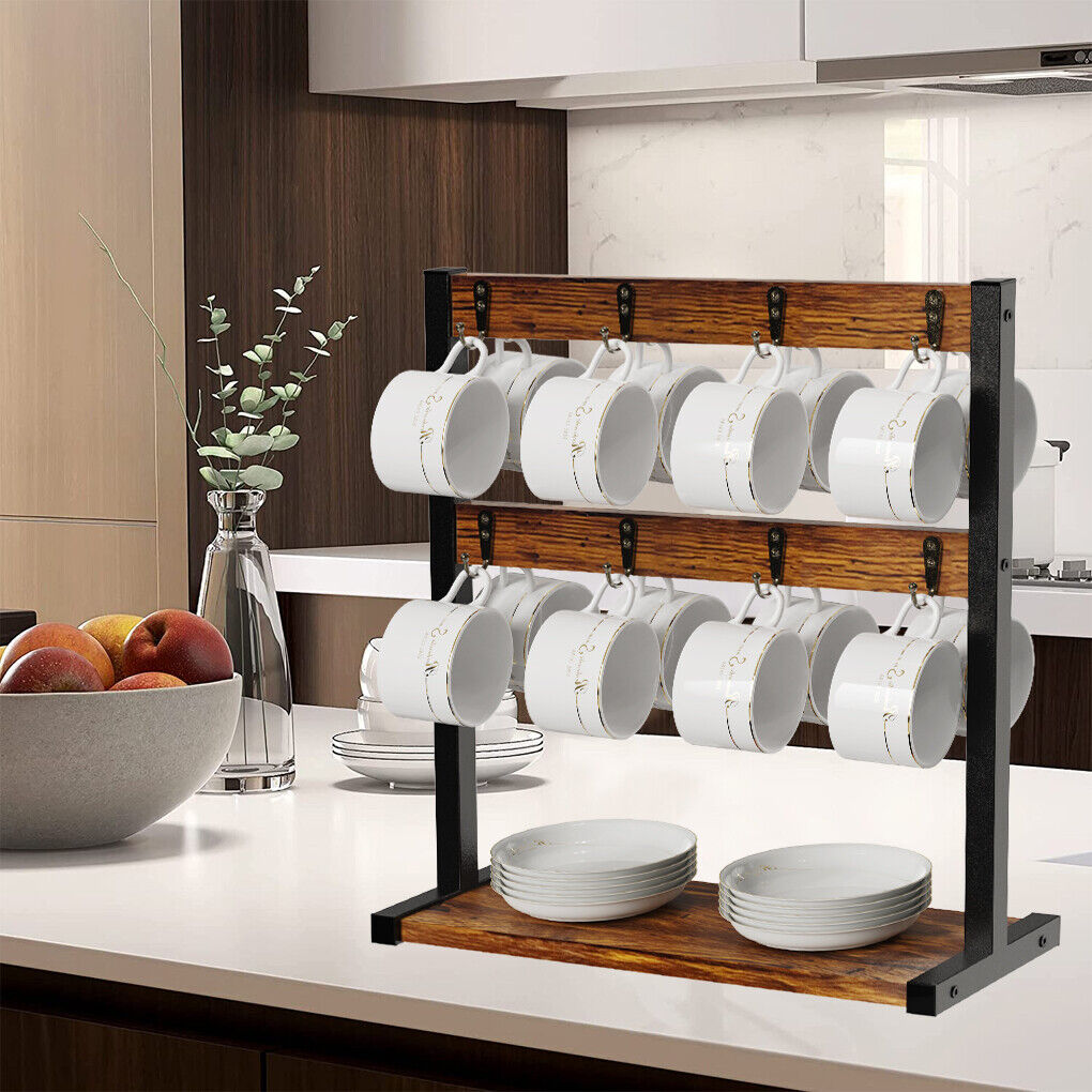 Wooden mug rack with white mugs on a kitchen counter.