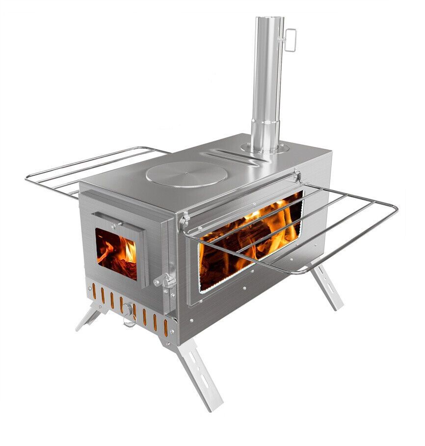 Portable wood stove with fire burning inside on a white background