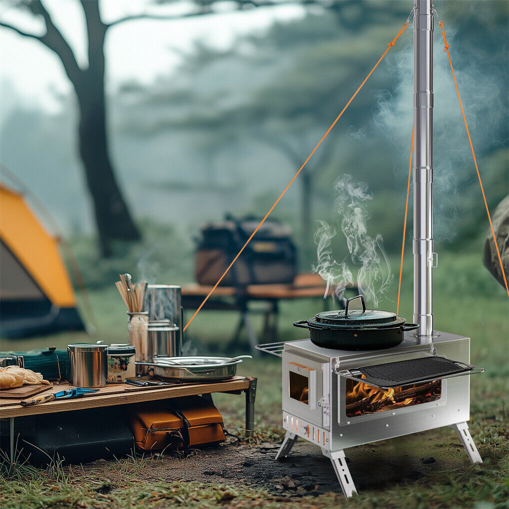 Camping stove with pots and pans on a table in a forest setting