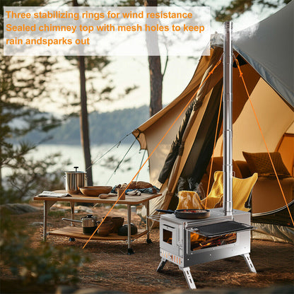 Camping scene with a stove, table, and tent by a lake.