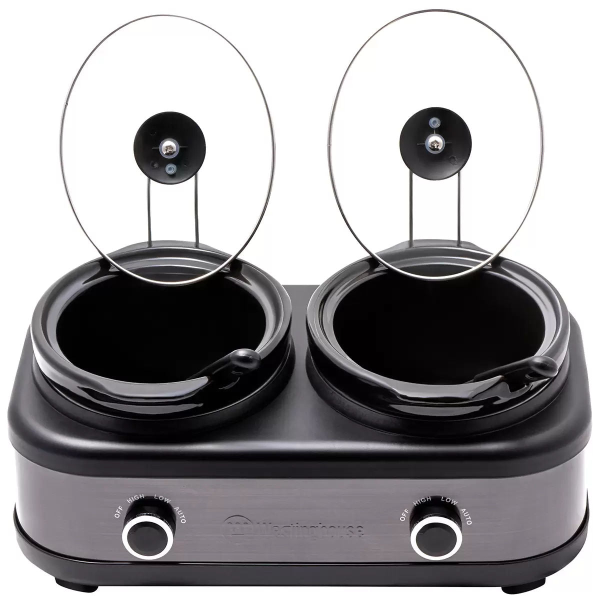 Double hot pot with glass lids on a white background