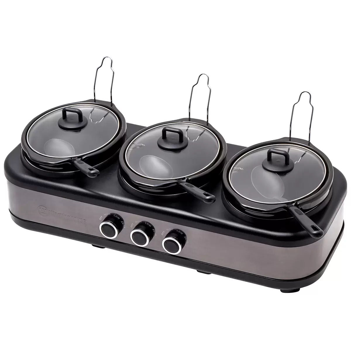 Triple burner cooktop with lids on a white background