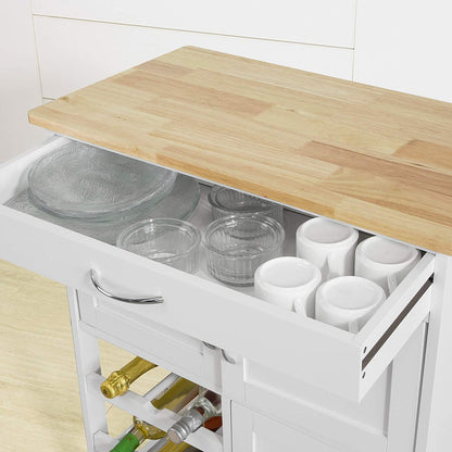 Kitchen island with open drawer containing glasses and cups, wooden countertop.