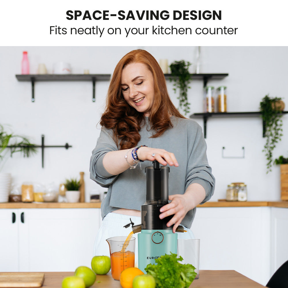 Woman using a juicer in a kitchen with text 'Space-saving design fits neatly on your kitchen counter'.