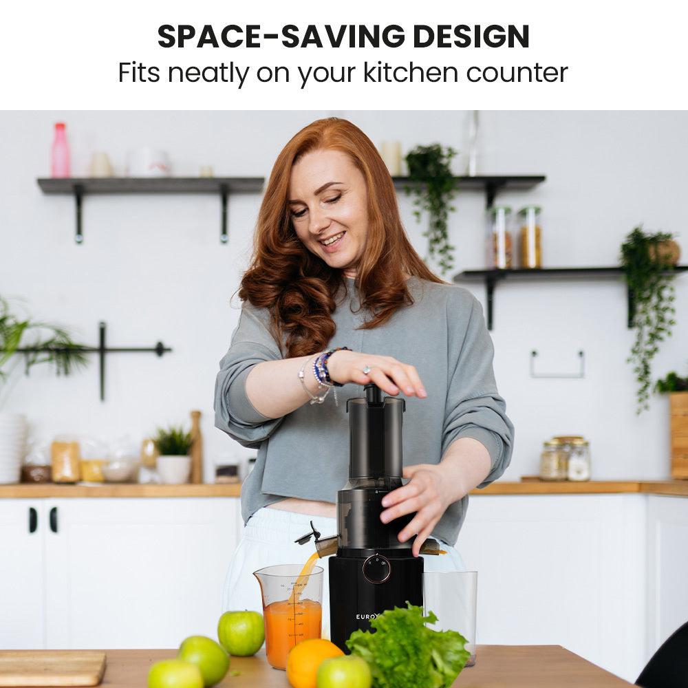 Woman using a juicer in a kitchen with text 'Space-saving design fits neatly on your kitchen counter'.