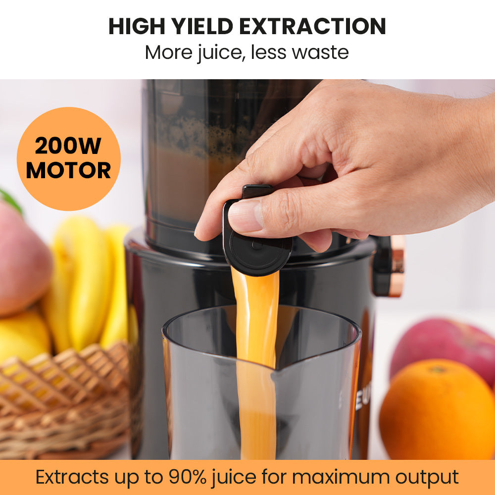 Juicer being used with fruits in the background, highlighting high yield extraction and 200W motor.