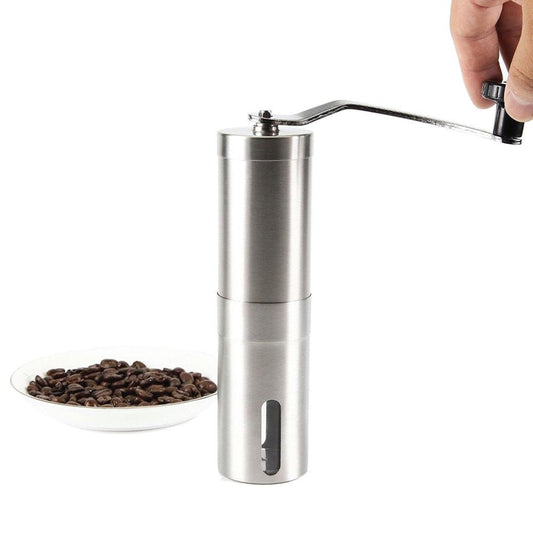 Handheld coffee grinder with a bowl of coffee beans on a white background
