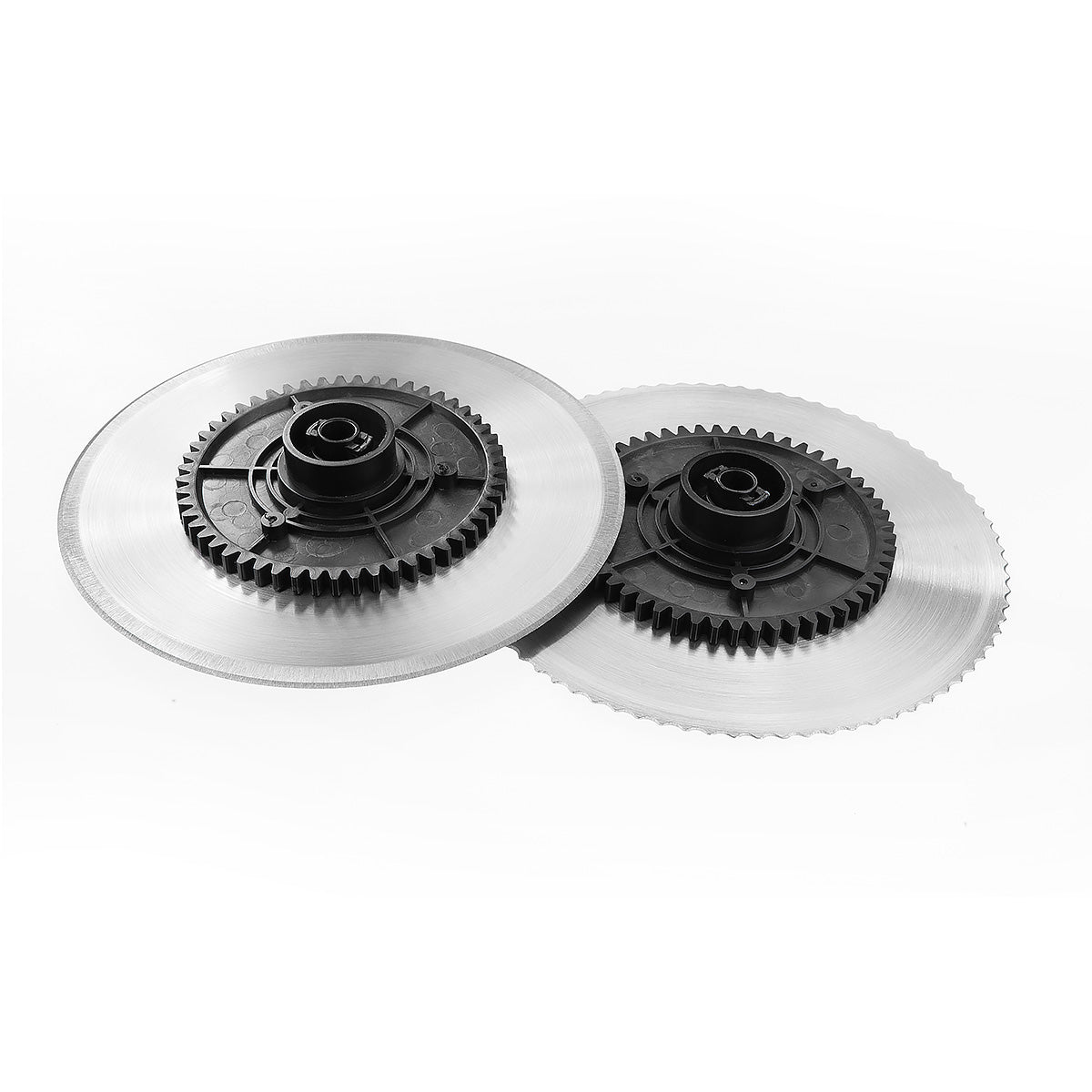 Two metallic gear discs on a white background