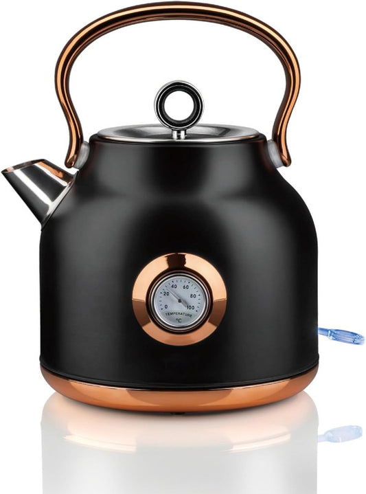 Black electric kettle with copper accents on a white background