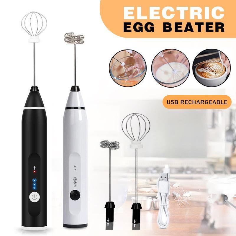 Electric egg beater with attachments on a white background