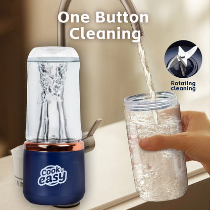 CookEasy cleaning device with a glass of water being poured into it, labeled 'One Button Cleaning'.