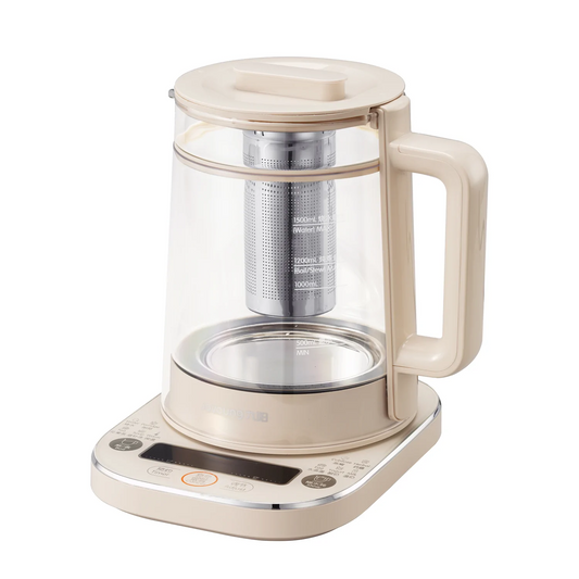 Beige electric tea maker with glass body and digital display on a white background