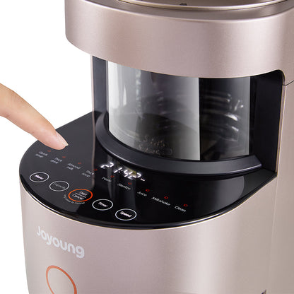 Joyoung kitchen appliance with a hand pressing a button on the control panel.