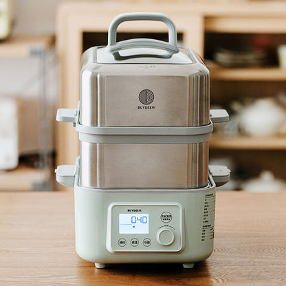 Stainless steel kitchen appliance with digital display on a wooden surface