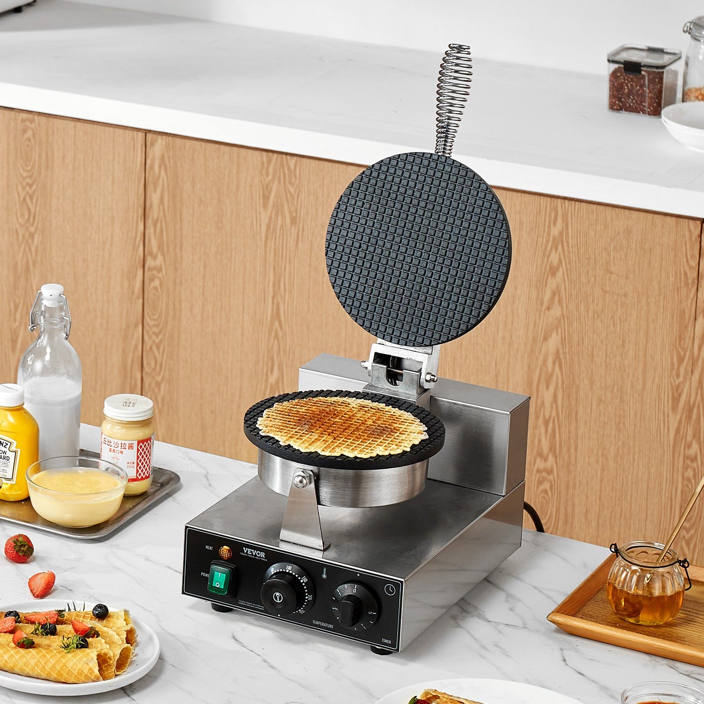 Waffle maker on a kitchen counter with waffle inside, surrounded by kitchen items.
