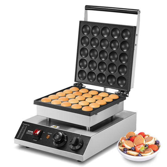 Waffle maker with round waffles and a bowl of fruit on a white background