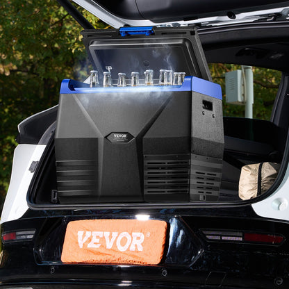 VEVOR portable refrigerator in a car trunk with visible branding