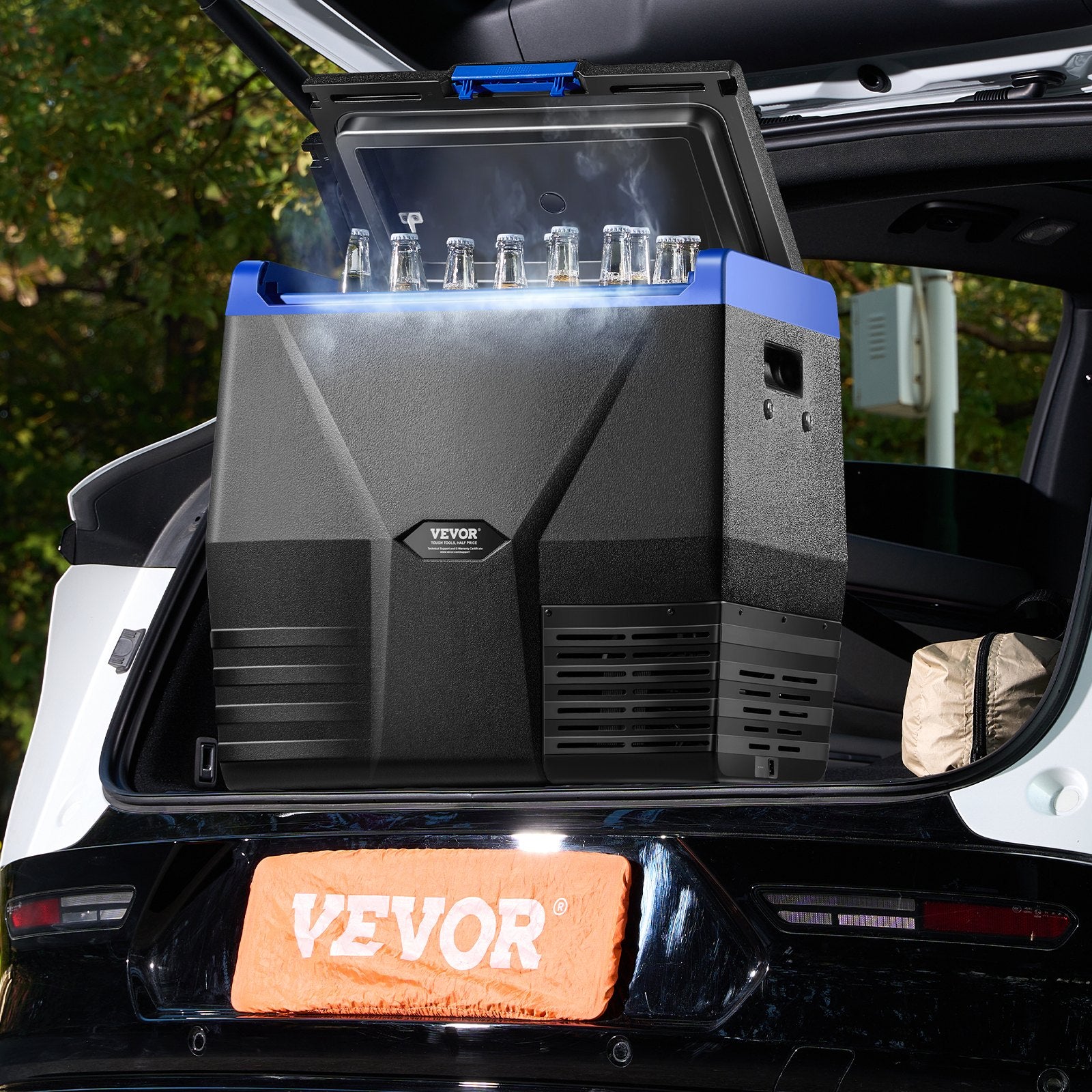 VEVOR portable cooler in a car trunk with visible branding