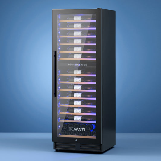 Wine cooler with glass door displaying bottles on a blue background, featuring the brand 'Devanti'.